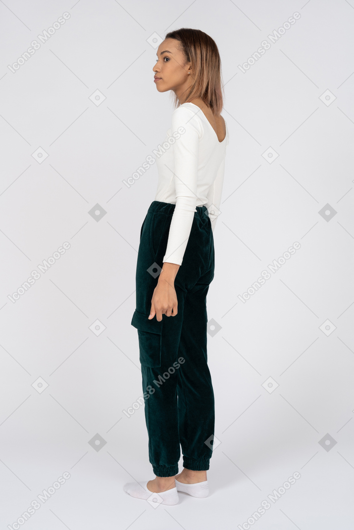 Woman in casual clothes standing