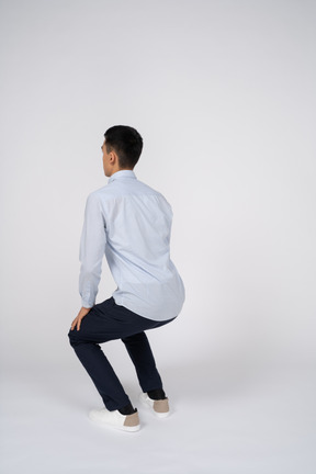 Man in casual clothes posing