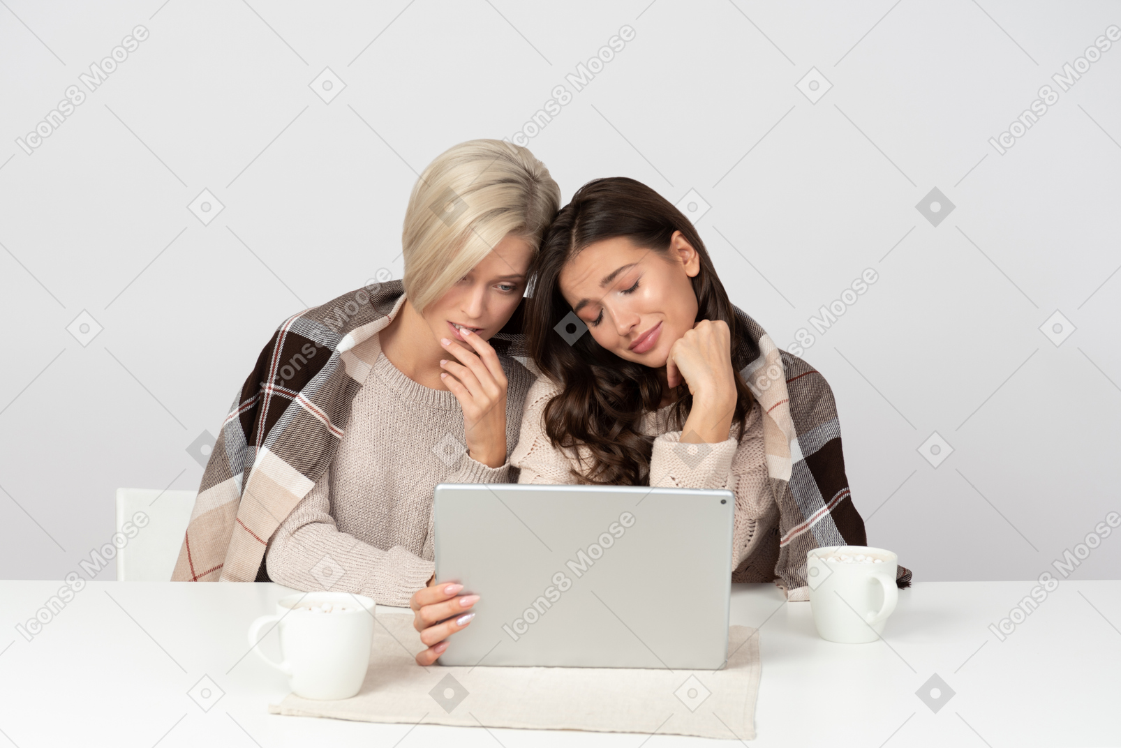 Young women watching movies and crying
