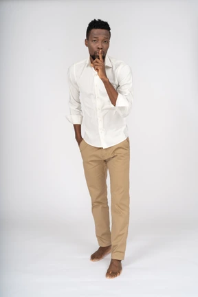 Man in white shirt standing