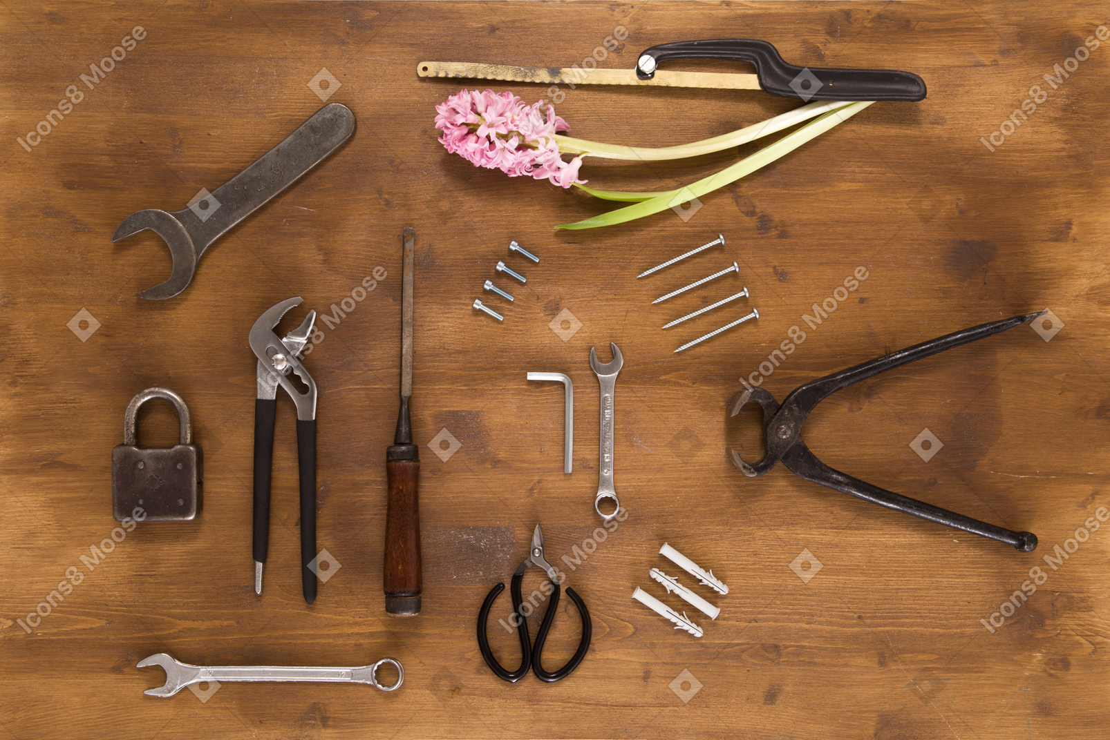 Common household tools on wooden background