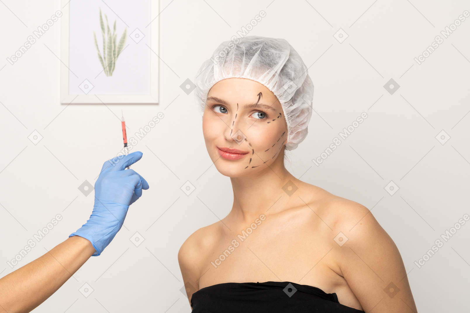 Cheerful young woman and hand holding syringe
