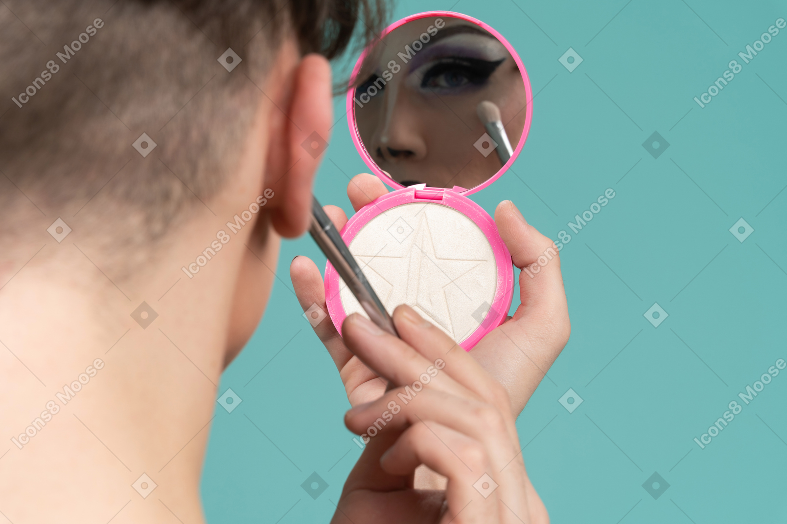 Back view of a person putting on eyeshadow
