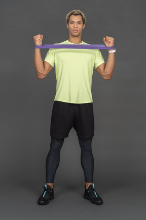 Man using resistance band for exercise