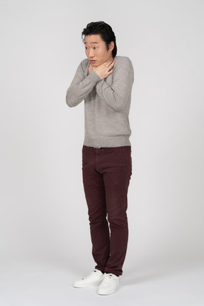 Man in casual clothes posing