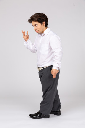 Side view of an employee showing three fingers