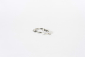 White carabiner on a white background