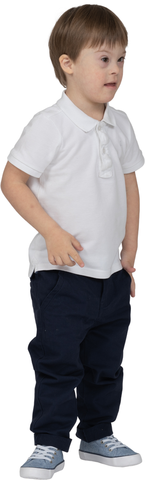 Three-quarter view of a boy standing