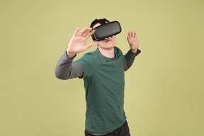 Man exploring digital world using virtual reality headset