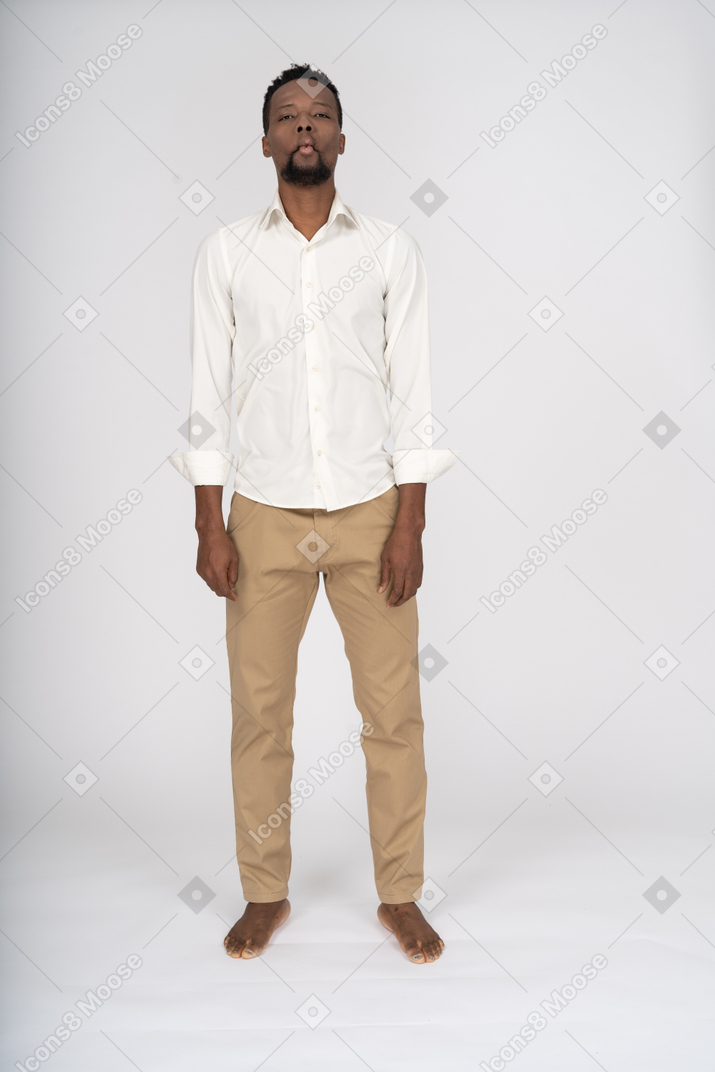 Man in white shirt standing