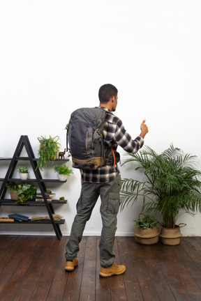 Good looking young man with a backpack