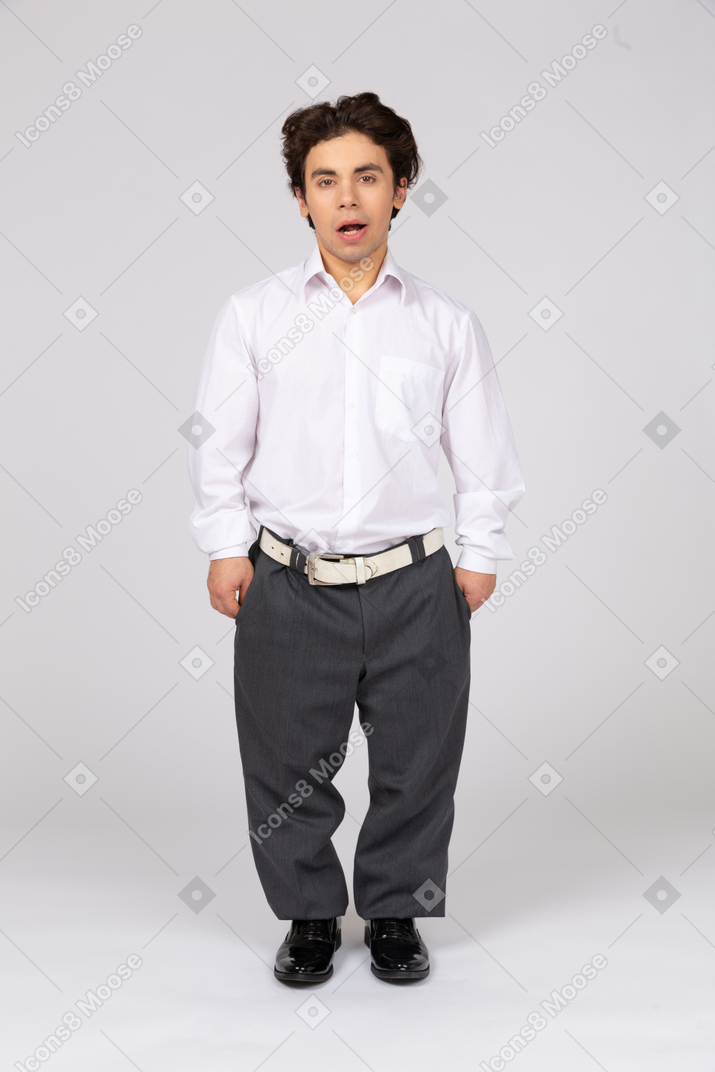 Young man standing with open mouth