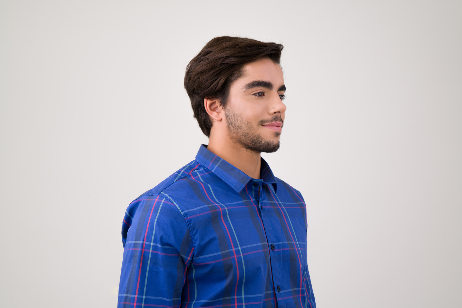 Young handsome man in a blue shirt
