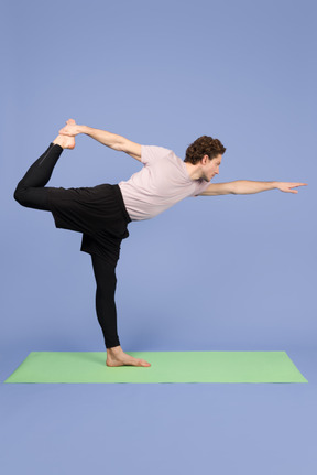 Young man making physical exercises