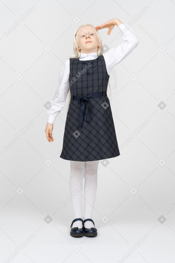 Schoolgirl saluting
