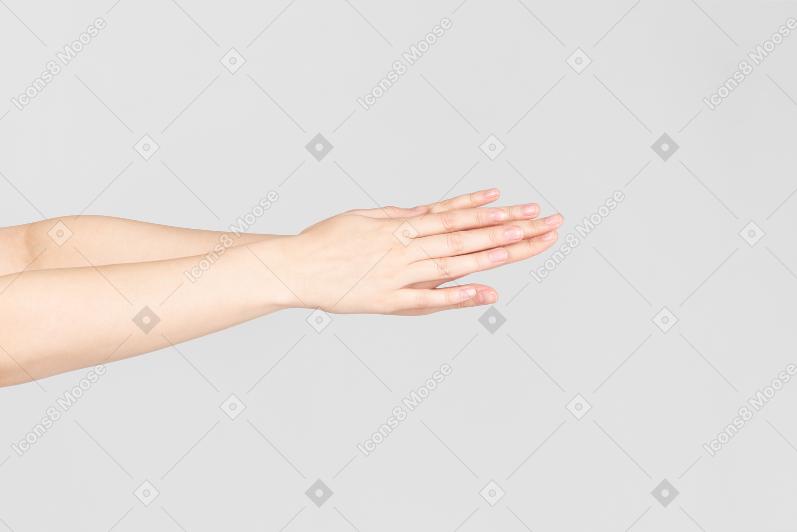 Female hands one touching another