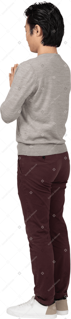 Man in casual clothes posing