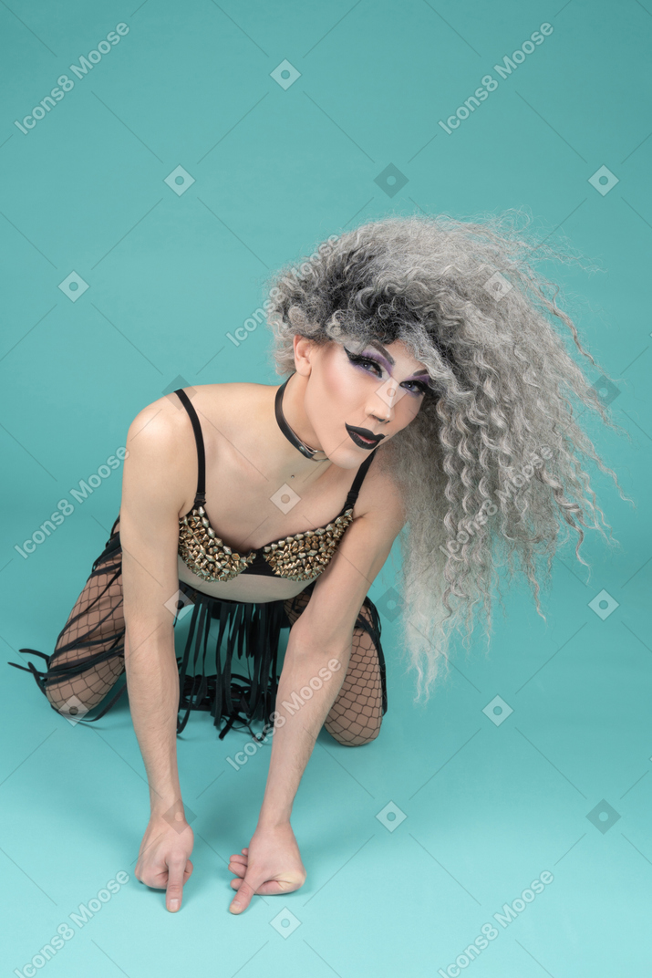 Drag queen standing on all fours