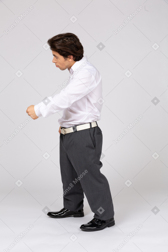 Side view of businessman clenched fist