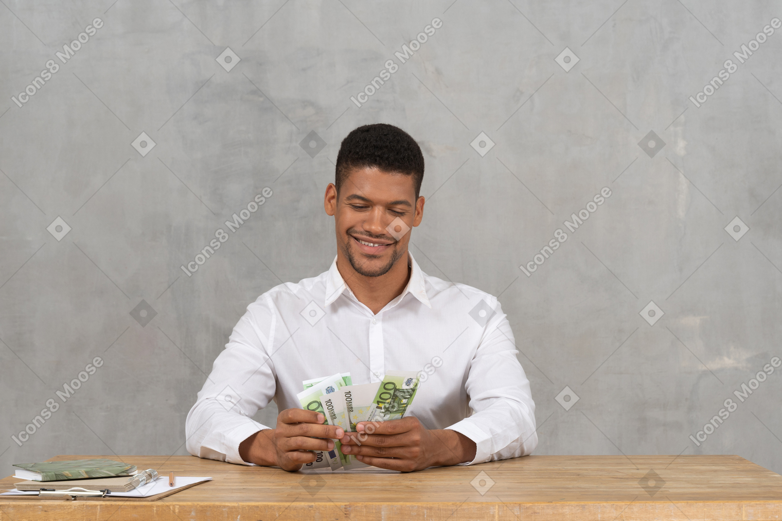 Young man counting money