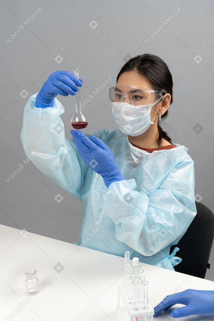 Medical worker holding sample