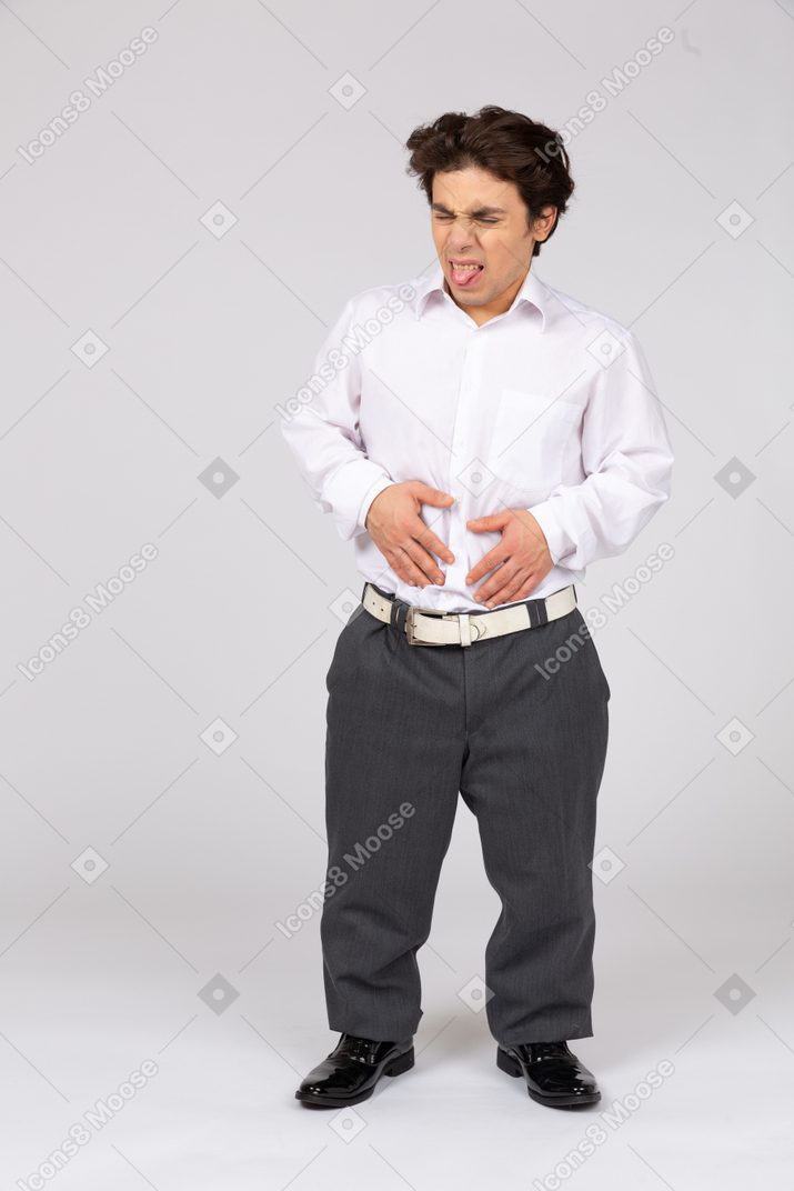 Man in business casual clothes looking disgusted