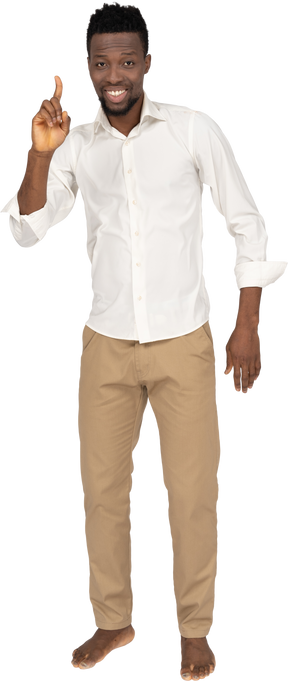 Man in white shirt standing