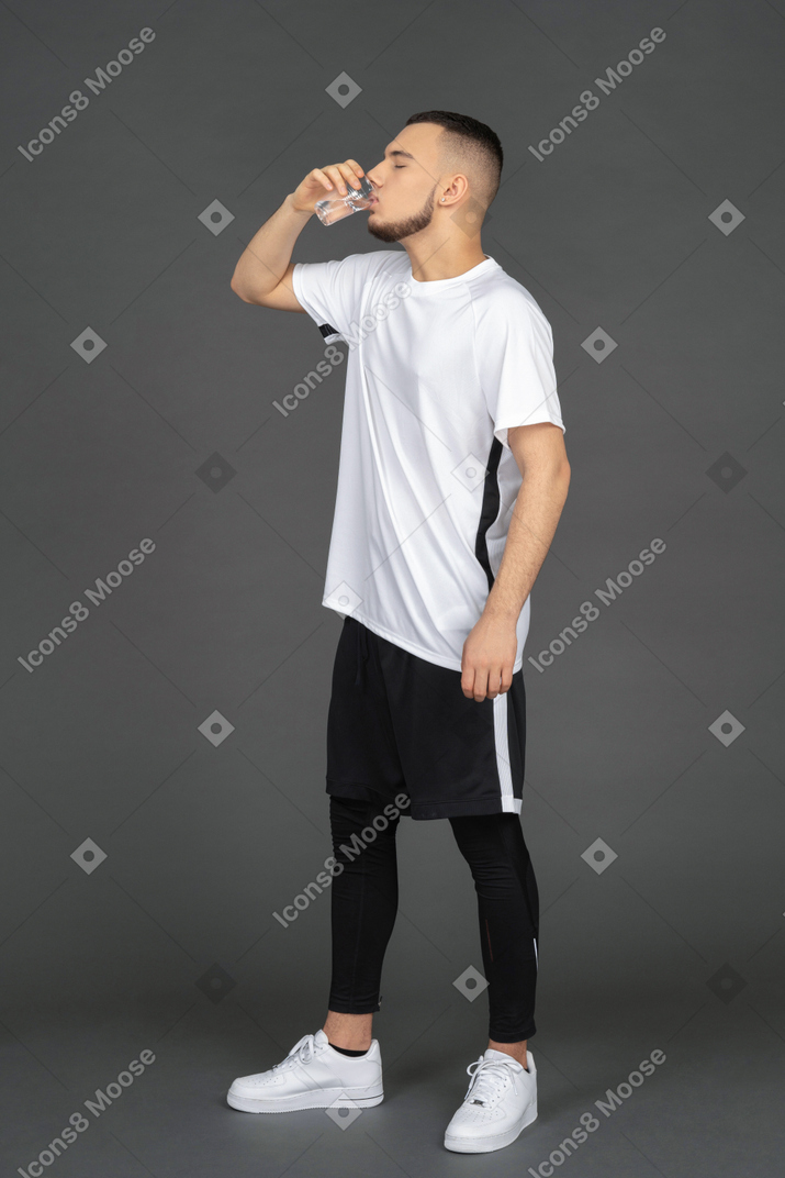 Young man drinking