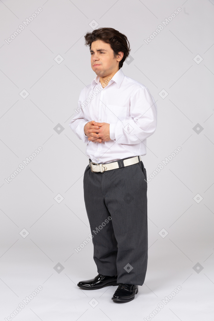 Man in formal wear feeling uncomfortable