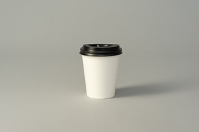 Plastic cup for hot drinks with a lid