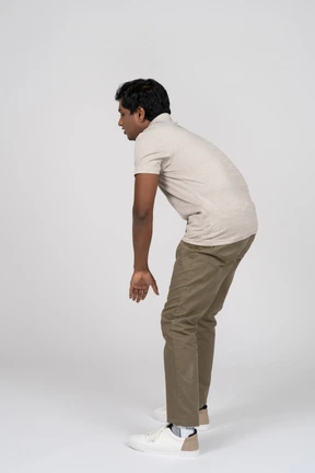 Man in casual clothes posing