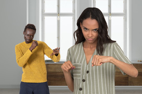 Man and woman ready to fight