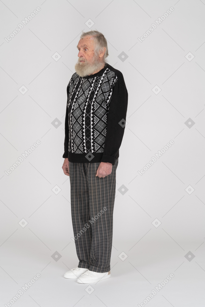 Side view of old man staring straight