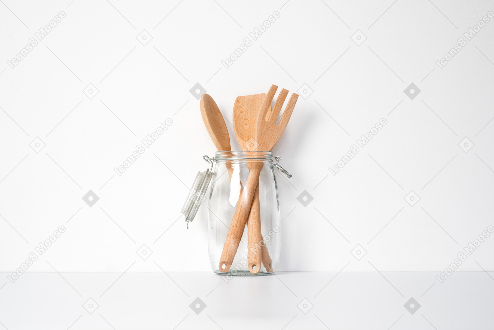 Wooden cutlery in glass jar