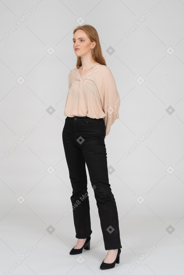 Woman in beautiful blouse standing