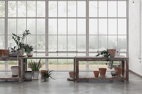 A minimalist living room with a concrete floor