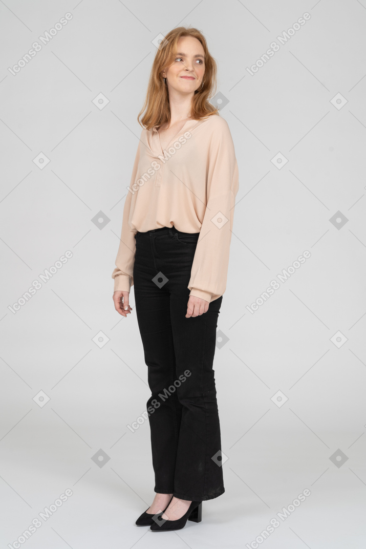 Woman in beautiful blouse standing