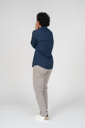 Rear view of a man in casual clothes