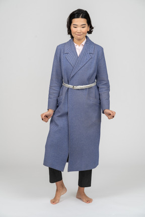 Smiling woman in blue coat