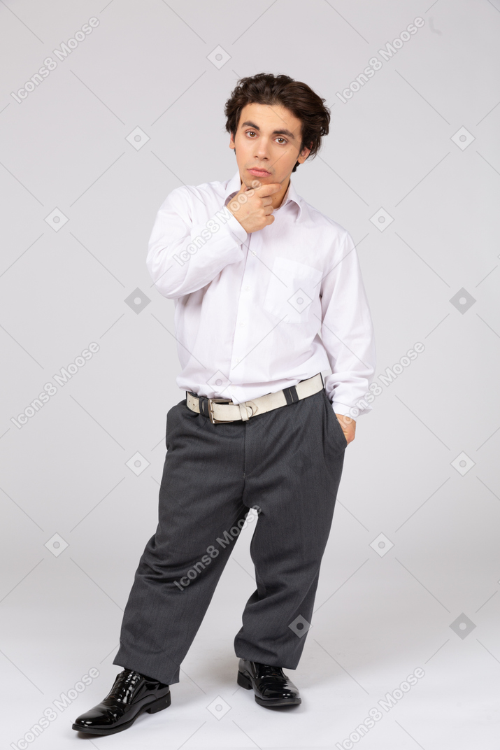 Young office worker thinking