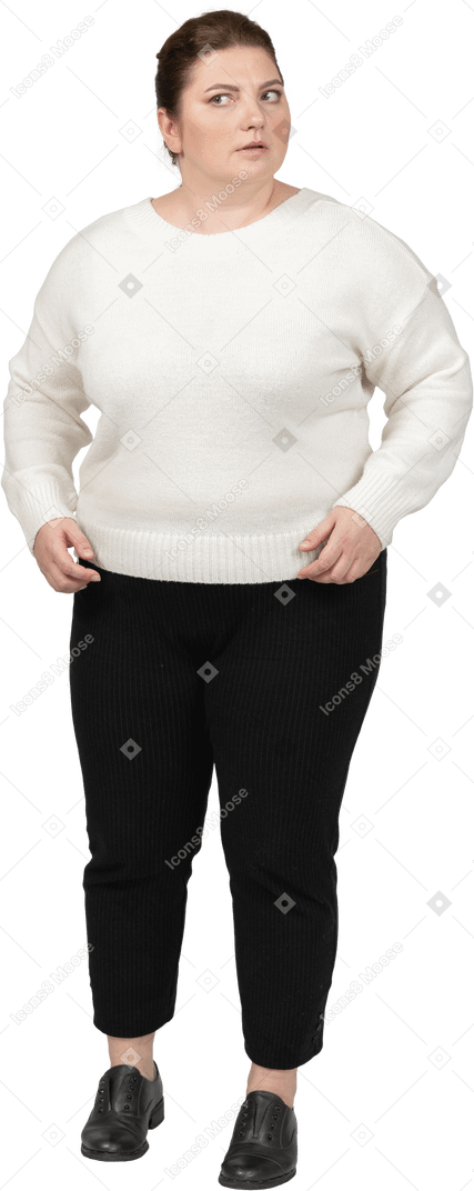 Surprised woman in casual clothes standing