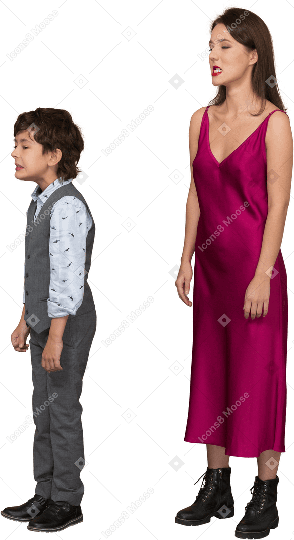 Side view of a young woman in red dress and boy