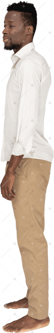 Man in white shirt standing