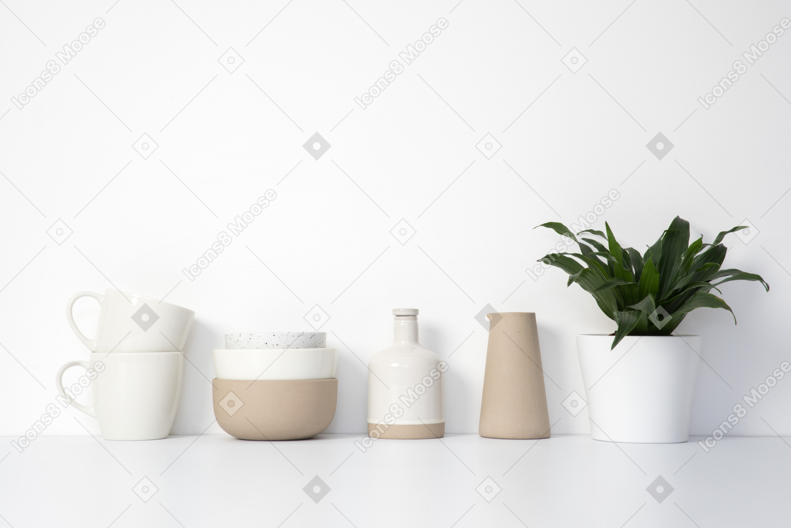 Ceramic kitchenware and house plant