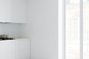 A minimalist kitchen in white