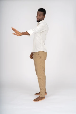 Man in white shirt standing