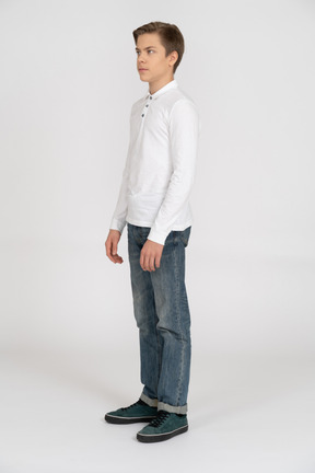 Young man in casual clothes standing