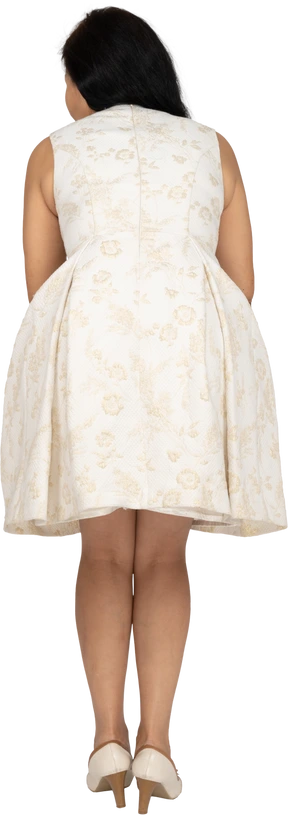 Woman in beautiful dress standing