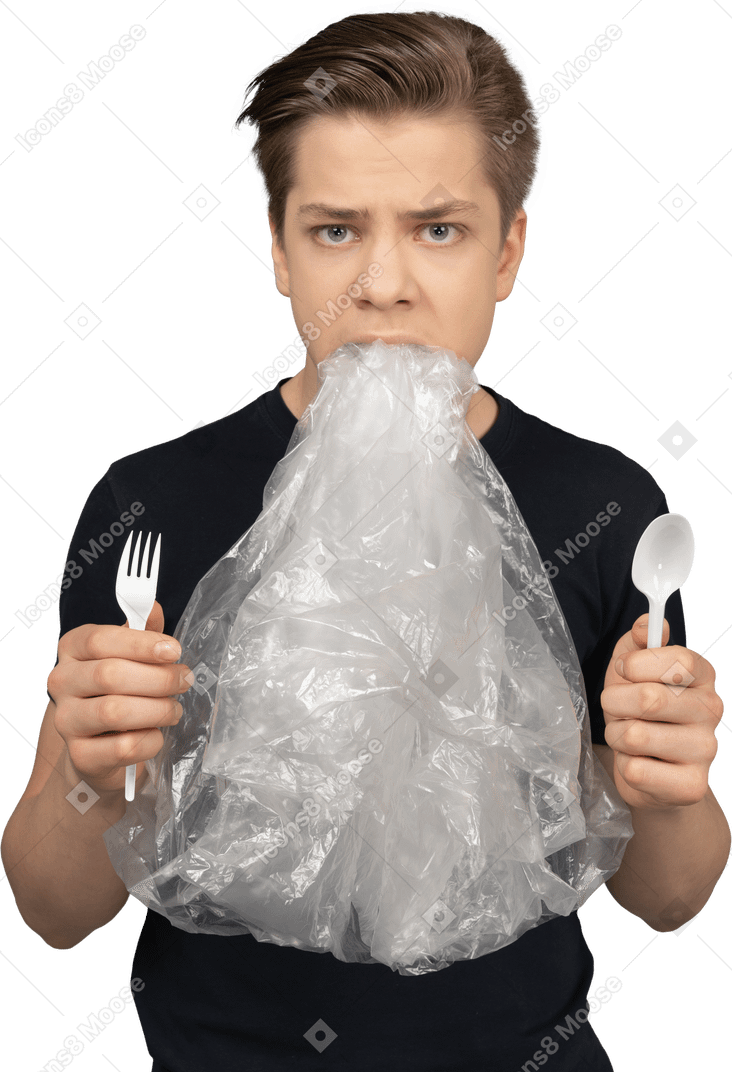Man holding plastic fork and spoon with plastic wrap in his mouth