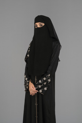 A muslim woman wearing a niqab